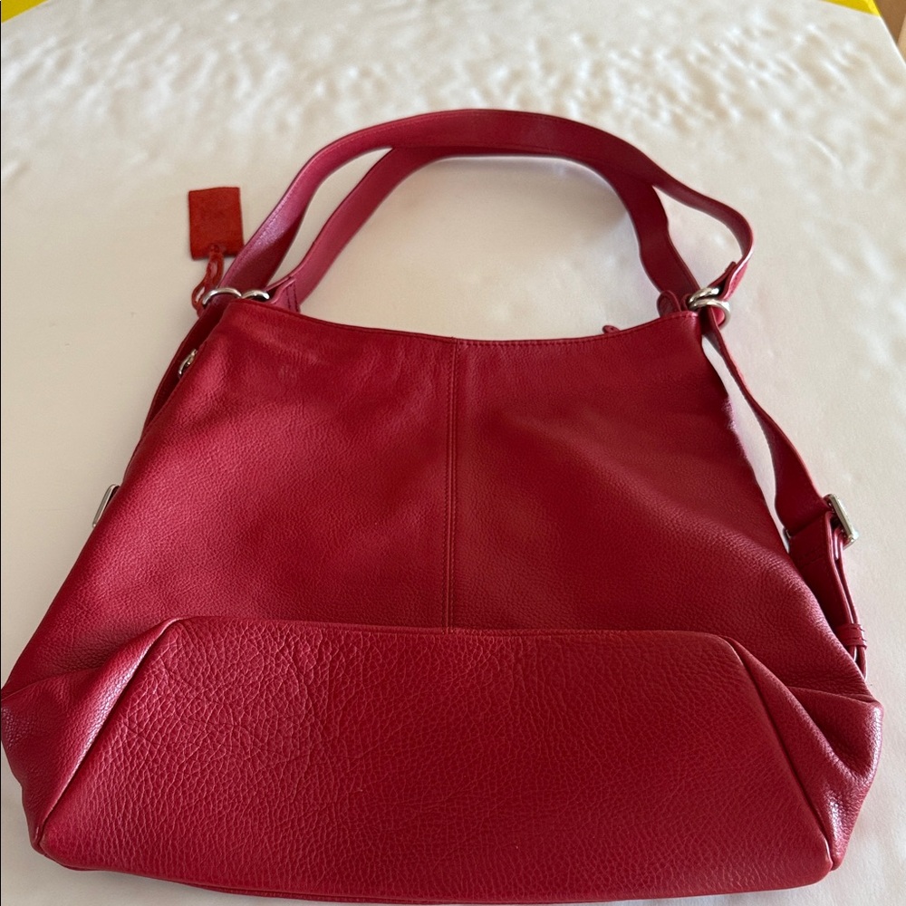Brand new leather bag from Japan. I have never carried it. It is a soft
